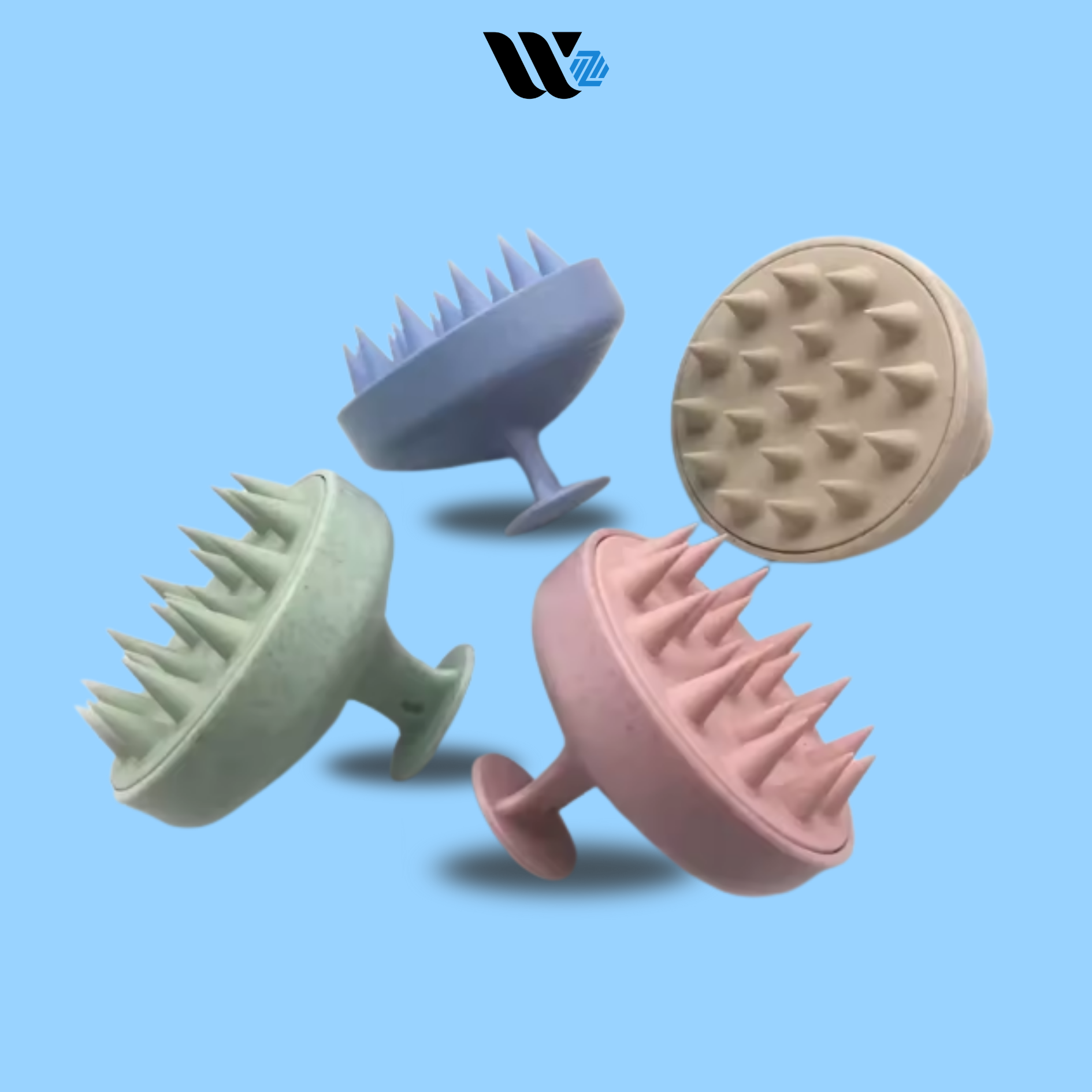 Four silicone scalp massagers in different colors on a blue background